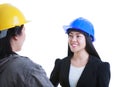 Asian engineer talking with construction worker. Isolated on white background. Royalty Free Stock Photo