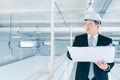 Asian engineer using tablet in industrial factory Royalty Free Stock Photo