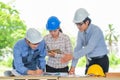 Asian engineers were consulted together plan in construction Royalty Free Stock Photo