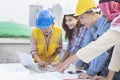 Asian engineers were consulted together and plan in construction site Royalty Free Stock Photo