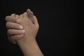 Asian face Child praying and worship to GOD Using hands to pray in religious beliefs and worship christian in the church or in gen