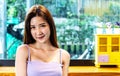 Asian face ,Portrait young Asian pretty woman smiling in cafe, She looking at the camera Royalty Free Stock Photo