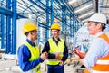 Asian factory worker and engineer as team Royalty Free Stock Photo