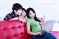 Asian family browsing the internet Royalty Free Stock Photo