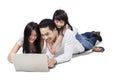 Asian family browsing internet online