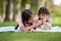 Asian family children elder sister comforts her younger sister Royalty Free Stock Photo