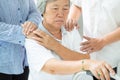 Asian family consoling depressed senior woman;sad elderly people with depressive symptoms need close care;hands on the shoulder; Royalty Free Stock Photo