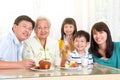 Asian family enjoyed tea time Royalty Free Stock Photo
