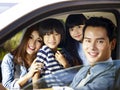 Asian family enjoying a car ride Royalty Free Stock Photo