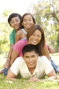 Asian Family Enjoying Day In Park Royalty Free Stock Photo