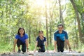 Family exercising and jogging together at the park Royalty Free Stock Photo