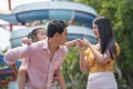 Asian family father mother and young daughter playing together at amusement park. concept family outing at the playground vacation Royalty Free Stock Photo