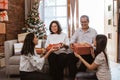Asian family gift exchange tradition on christmas Royalty Free Stock Photo