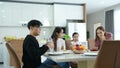 Asian family They are having breakfast together happily in the dining room Royalty Free Stock Photo