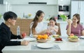 Asian family They are having breakfast together happily in the dining room Royalty Free Stock Photo