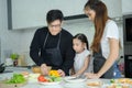 Asian family They are having cooking together happily in the kitchen room Royalty Free Stock Photo