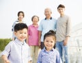 Asian family having fun together outdoors Royalty Free Stock Photo