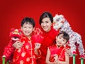 Asian family holding red packet money