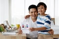 Asian family I love you, dad! Handsome man at home with his little boy. Happy Father`s Day. Concept Greeting card Royalty Free Stock Photo