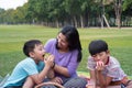 Asian family picnic Royalty Free Stock Photo