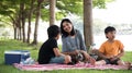 Asian family picnic Royalty Free Stock Photo