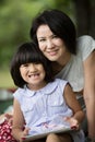 Asian family are playing together with a computer tablet in the Royalty Free Stock Photo