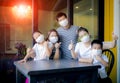 Asian family quarantine at home while corona virus ,covid-19 infected global