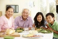 Asian family sharing meal at home