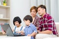 Asian family using laptop Royalty Free Stock Photo