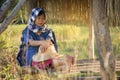 Asian farmer girl working at rice field on harvest season Royalty Free Stock Photo