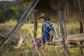 Asian farmer girl working at rice field on harvest season Royalty Free Stock Photo