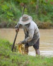 Asian farmer preparing the ground