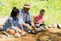 Asian farmers are teaching their children to care for the plants with patience and effort.