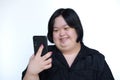 asian fat woman She smiles and laughs with aphasia or Down syndrome. She is a student with cerebral palsy wearing black on white