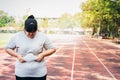 Asian fat women Using two hands to hold the excess fat In the area of her waist