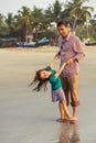 Asian father playing with his daughter Royalty Free Stock Photo