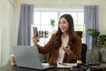 Asian female accountant talking on the phone She is a salesperson at a startup company. Royalty Free Stock Photo