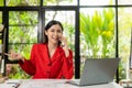 Asian female accountant talking on the phone She is a salesperson at a startup company. Royalty Free Stock Photo