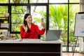 Asian female accountant talking on the phone She is a salesperson at a startup company. Royalty Free Stock Photo