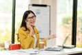 Asian female accountant talking on the phone She is a salesperson at a startup company. Royalty Free Stock Photo