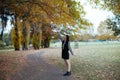 Asian female in autumn nature Royalty Free Stock Photo
