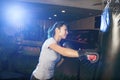 Asian female boxer practicing boxing