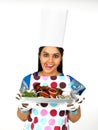 Asian female chef with her roasted chicken Royalty Free Stock Photo