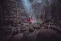 Asian female craftsman making the traditional hat in the old traditional house in Inle lake village, Shan State, Myanmar Royalty Free Stock Photo