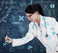 Asian female doctor drawing on transparent screen