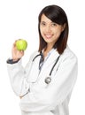 Asian female doctor holding green apple Royalty Free Stock Photo