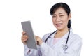 Asian female doctor holding a tablet Royalty Free Stock Photo