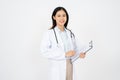 Asian female doctor woman in white medical gown hold clipboard isolated on white background Royalty Free Stock Photo