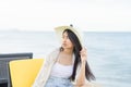 Asian female enjoying sunny day on tropical beach Royalty Free Stock Photo