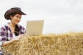 Asian female farmer sells rice straw as agricultural products and sells online. Royalty Free Stock Photo